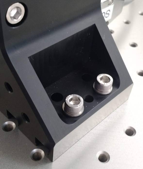 Use M6 washers and 25 mm socket head screws to loosely mount the LS units to the...