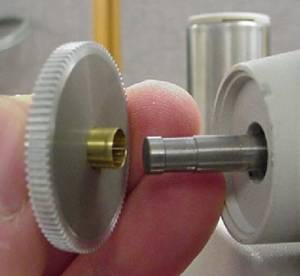 Figure 11. Installing zoom gear & spacer onto zoom shaft