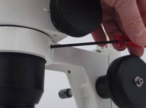 Figure # 3a. Removing the microscope from the focus carrier. Figure # 3a. Removing the microscope from the focus carrier.