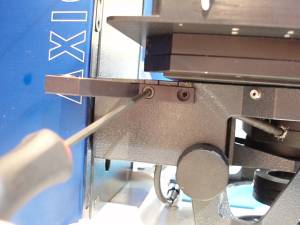 Figure 1a.Plunger stop mounts to stage carrier with the two screws as shown. 